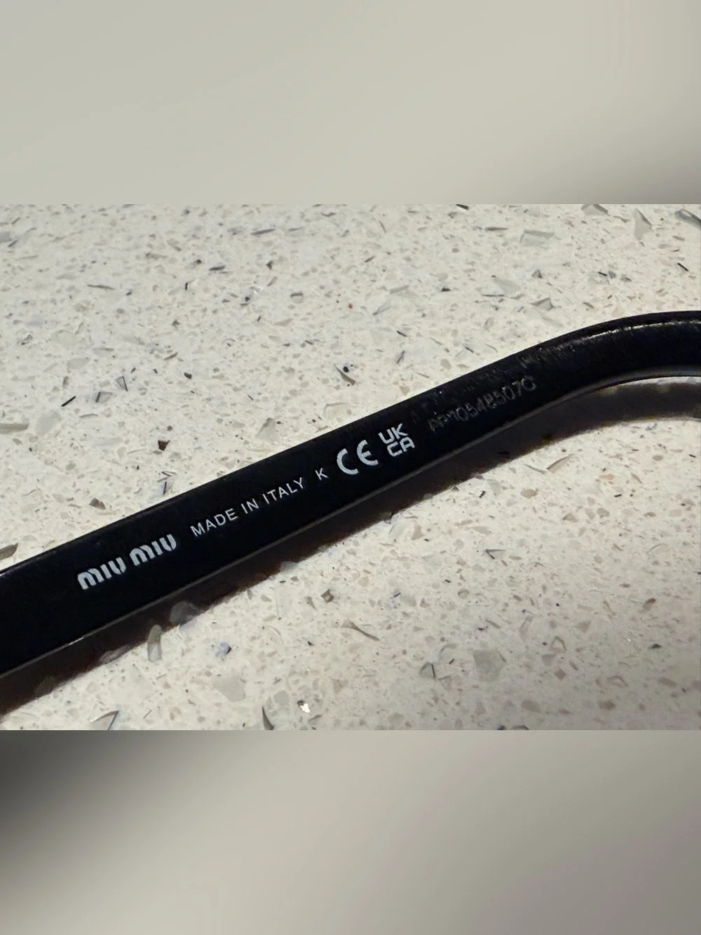 Miu Miu Black Sport Sunglasses with mirror Lenses